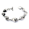 Stainless Steel Grinning Skulls Bracelet - 540005